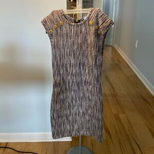 Purple interwoven w gold dress. Gold button & zipper. Shoulder pads.